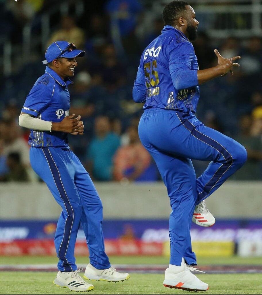 Kieron Pollard Celebrates the Wicket of Andre Russell. Pic Credits-Twitter