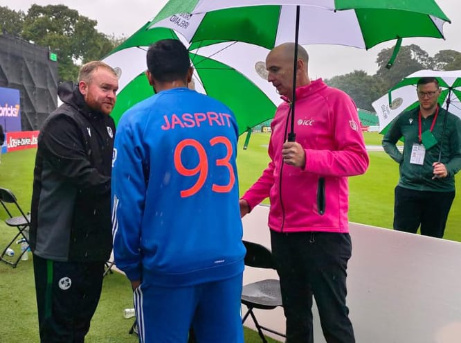 Both Team Captains Shaking Hands as the game was called off because of rain. Pic Credits-X