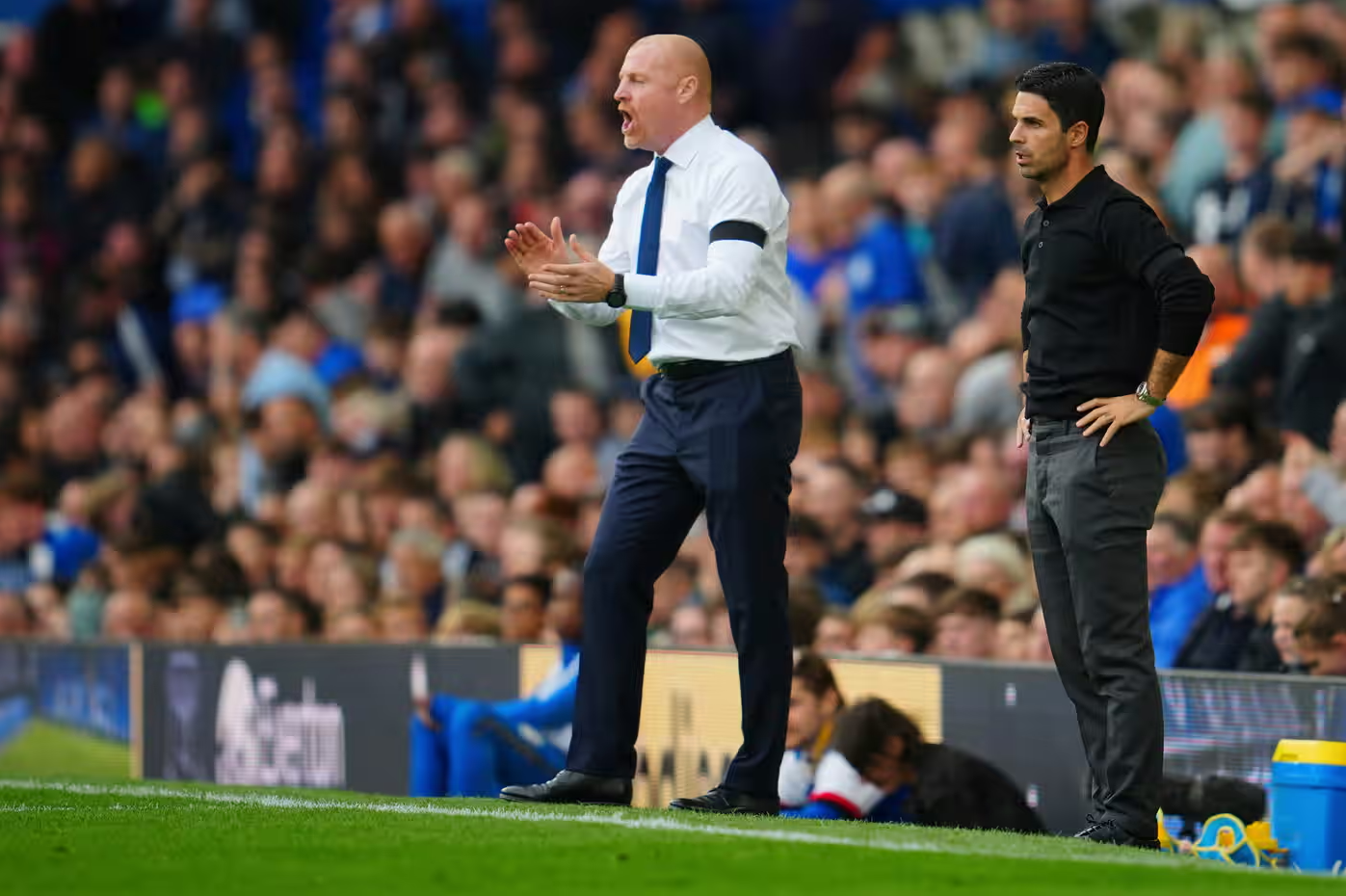 The tale of two manager, Sean Dyche - left and Arnela gaffer Mikel Arteta. (Photograph: Jon Super/AP)
