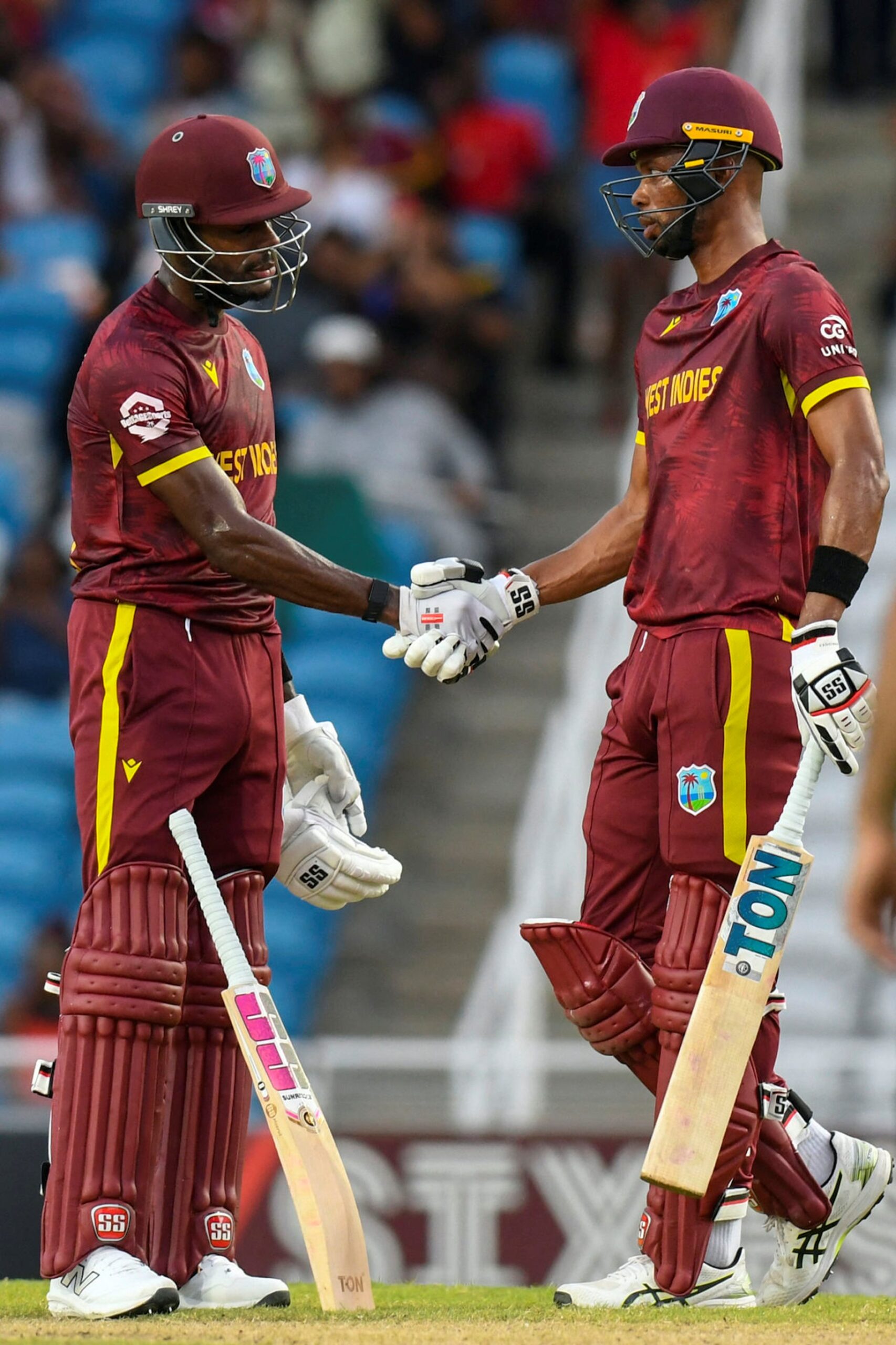 West Indies' Roston Chase & Justin Greaves. Pic Credits: Getty Images