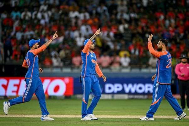 Bangladesh vs Varun Chakrvarthy, Suryakumar Yadav & Axar Patel. Pic Credits: AFP