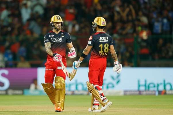 Virat Kohli & Faf du Plessis of RCB vs MI in IPL 2023. Pic Credits: Sportzpics