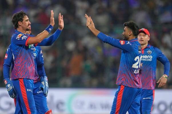 DC's Mitchell Starc & Axar Patel. Pic Credits: AP