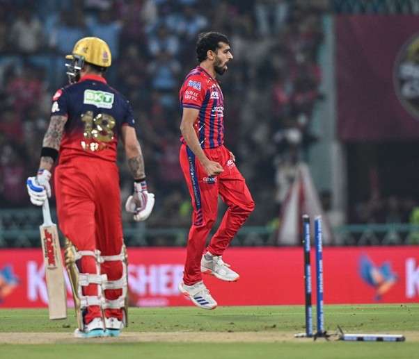 LSG's Prince Yadav & RCB's Virat Kohli. Pic Credits: AP