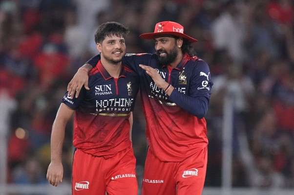 RCB's Rasikh Salam Dar & Kurnal Pandya. Pic Credits: BCCI