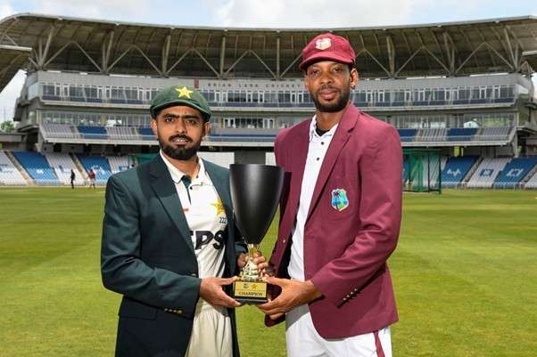 Pakistan's skipper Babar Azam and West Indies' skipper Roston Chase. Pic Credits: AFP